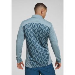 Męska bluza przedmeczowa z zamkiem 1/4 Olympique Marsylia PUMA. Niebieskie bluzy męskie Puma, m, bez wzorów, bez kaptura, do piłki nożnej. W wyprzedaży za 220.50 zł.