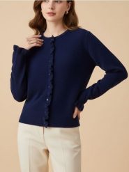 Kardigan z falbaną przy zapięciu - granatowy. Niebieskie kardigany damskie Sinsay, l, bez wzorów. Za 49.99 zł.