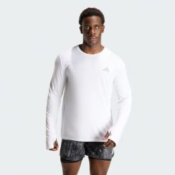 Koszulka adi365 Running Essentials Longsleeve. Białe buty sportowe męskie Adidas, bez wzorów, bez kołnierzyka, bez ramiączek, do biegania, climacool (adidas). Za 149.00 zł.