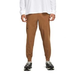 Spodnie treningowe męskie Under Armour Unstoppable Joggers. Brązowe buty sportowe męskie Under Armour, m, bez wzorów, z dresówki, na fitness i siłownię. W wyprzedaży za 321.10 zł.