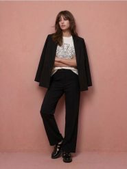 Materiałowe spodnie wide leg z wiskozą - czarny. Czarne spodnie materiałowe damskie Sinsay, l, bez wzorów, z materiału. Za 59.99 zł.