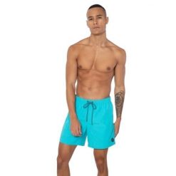 Szorty plażowe Protest Faster. Niebieskie krótkie spodenki sportowe męskie Protest, m, bez wzorów, do pływania. Za 201.00 zł.
