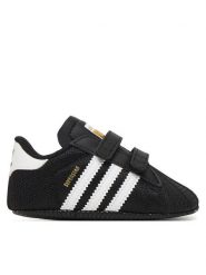 Adidas Sneakersy Superstar Crib JH9971 Czarny. Czarne buty sportowe chłopięce Adidas, bez wzorów, z materiału, bez zapięcia. Za 169.99 zł.