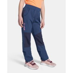 Dziewczęce spodnie outdoorowe kilpi KARIDO-JG. Niebieskie spodnie sportowe dla dziewczynek Kilpi, na jesień, bez wzorów, z materiału, trekkingowe. Za 193.50 zł.