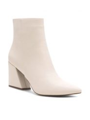 Nine West Botki SATI 13196A Biały. Białe botki damskie Nine West, z syntetyku, bez obcasa, na słupku, bez zapięcia. Za 279.99 zł.