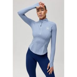 Damska bluza sportowa szybkoschnąca Rough Radical Eris. Niebieskie bluzy sportowe damskie ROUGH RADICAL, bez wzorów, bez kaptura, do biegania. Za 179.90 zł.