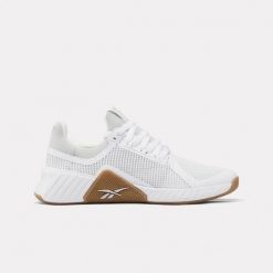 Damskie buty treningowe Reebok FLIP CHARGE 100272303 białe. Białe obuwie sportowe damskie Reebok, bez wzorów, na fitness i siłownię. Za 209.00 zł.