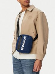 Reebok Saszetka WBEOHP-RBK-P-001-10 Granatowy. Niebieskie torby i plecaki dziecięce Reebok, z materiału. Za 59.99 zł.