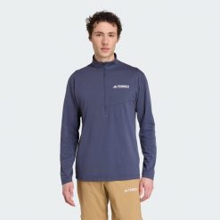 Koszulka Terrex Multi Climacool 1/2 Zip Long Sleeve. Niebieskie koszulki sportowe męskie Adidas, m, bez wzorów, bez kołnierzyka, bez ramiączek, trekkingowe, climacool (adidas). W wyprzedaży za 168.35 zł.