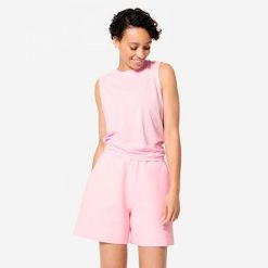 Koszulka fitness damska bez rękawów. Czerwone koszulki sportowe damskie Decathlon, bez wzorów, z elastanu, na fitness i siłownię. Za 84.99 zł.