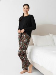 Spodnie piżamowe z szeroką nogawką i kwiatowym motywem - wielobarwny. Piżamy damskie Sinsay, l, bez wzorów, bez ramiączek. Za 29.99 zł.