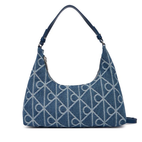 Torebka Calvin Klein. Niebieskie torebki do ręki damskie Calvin Klein, bez wzorów, z denimu, klasyczne, bez dodatków. Za 301.99 zł.