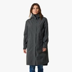 Płaszcz wiatroszczelny kobieca Swedemount Öckerö Shell Coat. Niebieskie płaszcze damskie SWEDEMOUNT, xl, bez wzorów, z materiału, moda ciążowa, długie, z kapturem. Za 699.99 zł.
