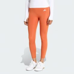 Legginsy 7/8 bez szwu z przodu Optime Essentials. Brązowe legginsy damskie Adidas, bez wzorów. Za 219.00 zł.