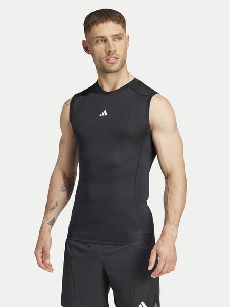 Adidas Koszulka techniczna TECHFIT Compression Training JE6694 Czarny Slim Fit. Czarne koszulki sportowe męskie Adidas, m, bez wzorów, z syntetyku, bez kołnierzyka, bez ramiączek, na fitness i siłownię, techfit (adidas). Za 104.99 zł.