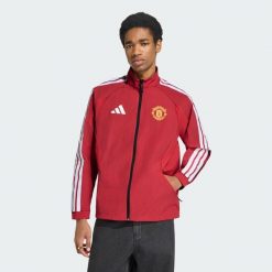 Podstawowa bluza reprezentacyjna Manchester United. Czerwone bluzy męskie Adidas, l, bez wzorów, z materiału, bez kaptura. Za 529.00 zł.