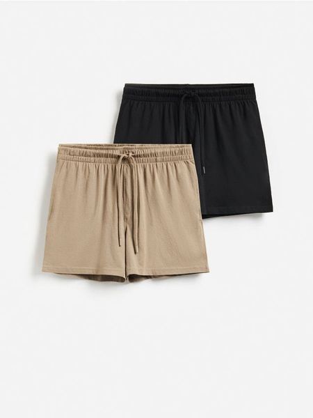 Szorty piżamowe 2 pack - czarny. Czarne piżamy męskie Reserved, l, bez wzorów, z bawełny, bez ramiączek, krótkie. Za 79.99 zł.