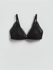 Koronkowy biustonosz z fiszbinami - czarny. Czarne biustonosze Reserved, bez wzorów, z koronki. Za 69.99 zł.