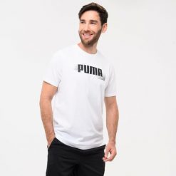 Koszulka z krótkim rękawem męska Puma Gym & Pilates. Brązowe koszulki sportowe męskie Puma, m, bez wzorów, z bawełny, bez kołnierzyka, bez ramiączek, na fitness i siłownię. Za 59.99 zł.