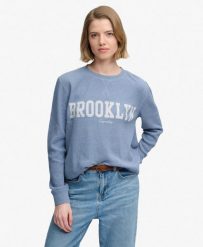 Superdry Damska koszulka z długim rękawem Athletic Essential bawełna – Tidal. Niebieskie koszulki sportowe damskie Superdry., bez wzorów, z bawełny, bez kołnierzyka, bez ramiączek. Za 164.65 zł.