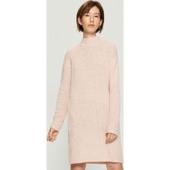 Dzianinowa sukienka oversize - Różowy. Czerwone sukienki damskie Sinsay, z dzianiny. Za 99.99 zł.