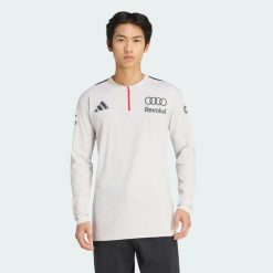 KOSZULKA POLO Z DŁUGIM RĘKAWEM AUDI REVOLUT F1 TEAM ENGINEERS & MARKETING. Białe koszulki polo męskie Adidas, l, bez wzorów, z dzianiny, sportowe, bez ramiączek. Za 399.00 zł.