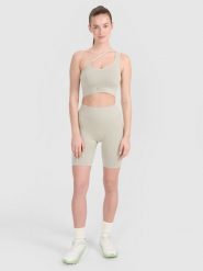 4F Legginsy kolarki bezszwowe treningowe damskie - beżowe M/L. Brązowe legginsy damskie 4f, l, bez wzorów. W wyprzedaży za 59.99 zł.