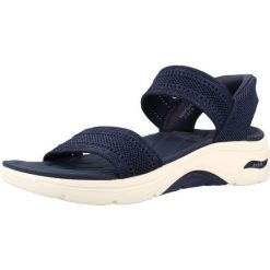 Sandały SKECHERS 140844S Niebieski. Niebieskie sandały damskie Skechers, bez wzorów, z tkaniny, bez obcasa, bez zapięcia. Za 278.99 zł.