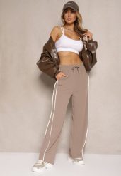 Brązowe Szerokie Spodnie Dresowe High Waist Zdobione Lampasami Sopaline. Brązowe spodnie dresowe damskie Renee, l, z aplikacjami, z dresówki, trekkingowe. Za 49.99 zł.