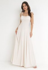 Beżowa Rozkloszowana Sukienka Maxi z Wiązanymi Ramiączkami Lisija. Brązowe sukienki damskie Born2be, m, bez wzorów, eleganckie, bez kołnierzyka, bez ramiączek, maxi, rozkloszowane. Za 129.99 zł.