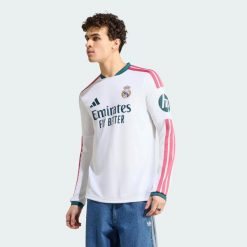 Koszulka podstawowa z długim rękawem Real Madryt 26/27. Białe koszulki sportowe męskie Adidas, xl, bez wzorów, z dzianiny, bez kołnierzyka, bez ramiączek, do piłki nożnej, climacool (adidas). Za 479.00 zł.