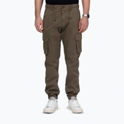 Spodnie męskie Pitbull Proctor Drawstring Joggery Cargo. Zielone spodnie sportowe męskie PITBULL, m, bez wzorów, z bawełny, na fitness i siłownię. Za 229.99 zł.