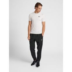 Jogging Hummel GG 12. Czarne spodnie sportowe męskie Hummel, s, bez wzorów, do biegania. W wyprzedaży za 167.75 zł.