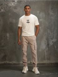 Spodnie cargo jogger - beżowy. Brązowe spodnie materiałowe męskie Sinsay, bez wzorów. Za 99.99 zł.