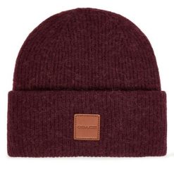 Czapka Coach. Fioletowe czapki i kapelusze damskie Coach, na zimę, bez wzorów. Za 409.99 zł.