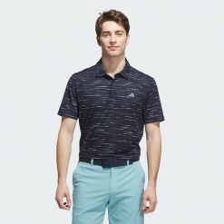 Koszulka Ultimate365 Mesh Glimmer Print Polo. Niebieskie buty sportowe męskie Adidas, m, bez wzorów, z meshu, bez kołnierzyka, bez ramiączek, na golfa. Za 279.00 zł.