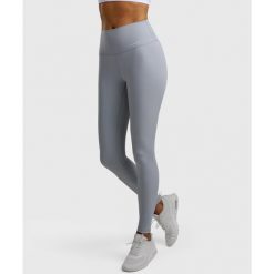 Legginsy sportowe damskie. Niebieskie legginsy sportowe damskie NORDICDOTS, bez wzorów, z materiału, długie, tenisowe. Za 365.00 zł.