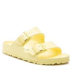 Klapki Birkenstock. Żółte klapki damskie Birkenstock, bez wzorów, bez obcasa. Za 189.99 zł.