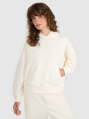 4F Bluza dresowa nierozpinana z kapturem damska - beżowa XS. Brązowe bluzy sportowe damskie 4f, uniwersalny, bez wzorów, z bawełny, z kapturem. Za 159.99 zł.
