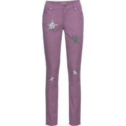 Spodnie SKINNY z gwiazdami bonprix ciemny bez. Spodnie materiałowe damskie marki DOMYOS. Za 54.99 zł.