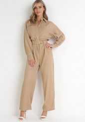 Beżowy Kombinezon z Paskiem Phynne. Brązowe sukienki damskie Born2be, m, bez wzorów, z materiału, eleganckie, bez kołnierzyka, bez ramiączek. Za 259.99 zł.