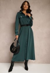 Zielona Satynowa Sukienka w Stylu Szmizjerki z Imitacjami Kieszeni i Paskiem Vaminay. Zielone sukienki damskie Renee, l, bez wzorów, z satyny, eleganckie, bez kołnierzyka, bez ramiączek, maxi, kopertowe. Za 99.99 zł.