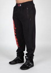 Augustine Stara szkoła Spodnie - Czarny/Czerwony. Czarne spodnie sportowe męskie GORILLA WEAR, xl, bez wzorów, z materiału, na fitness i siłownię. Za 229.00 zł.