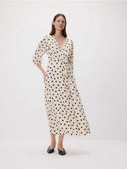 Sukienka maxi z wiązaniem - kremowy. Białe sukienki damskie Reserved, l, bez wzorów, z wiskozy, bez kołnierzyka, bez ramiączek, maxi, rozkloszowane. Za 199.99 zł.