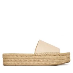 Espadryle Calvin Klein. Brązowe espadryle damskie Calvin Klein, bez wzorów, bez obcasa, bez zapięcia. Za 449.99 zł.