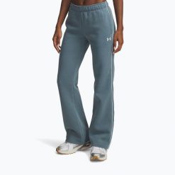 Spodnie damskie Under Armour Rival Fleece Piped. Niebieskie obuwie sportowe damskie Under Armour, bez wzorów, na fitness i siłownię. Za 249.99 zł.
