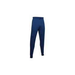 Spodnie dresowe Under Armour DOUBLE KNIT. Niebieskie spodnie sportowe męskie Under Armour, m, bez wzorów, z bawełny, na fitness i siłownię. Za 310.20 zł.