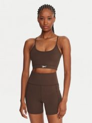 Reebok Biustonosz sportowy Reebok X Ewa Chodakowska RK25312CCW Brązowy. Brązowe koszulki sportowe damskie Reebok, l, bez wzorów, z syntetyku, bez kołnierzyka, bez ramiączek, na fitness i siłownię. Za 149.99 zł.