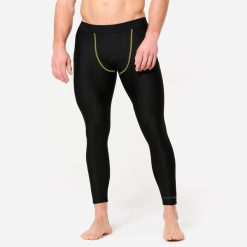 Legginsy do MMA męskie. Czarne legginsy sportowe męskie DOMYOS, m, bez wzorów, z elastanu. Za 99.99 zł.