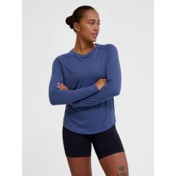 Damska koszulka z długim rękawem Hummel Vanja. Niebieskie koszulki sportowe damskie Hummel, bez wzorów, z tkaniny, sportowe, bez kołnierzyka. Za 180.00 zł.